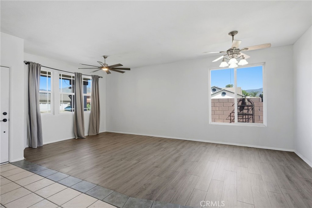 1853 Rue Chablis San Jacinto, CA 92583 - Photo 5 of 27 a view of livingroom with hardwood floor and hallway