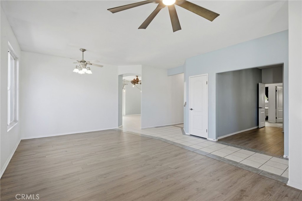 1853 Rue Chablis San Jacinto, CA 92583 - Photo 6 of 27 wooden floor in an empty room with a fan