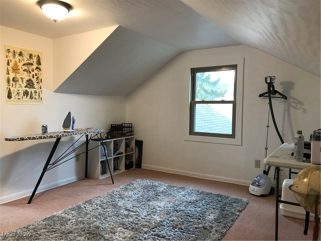 8330 Knauf Road Canfield, OH 44406 - Photo 18 of 34 Carpeted home office featuring baseboards and vaulted ceiling