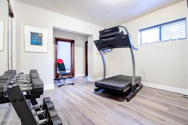 swimming pool view with sitting space and garden view