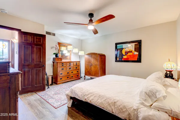 a view of a swimming pool with chairs