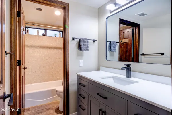 a view of a swimming pool with seating area