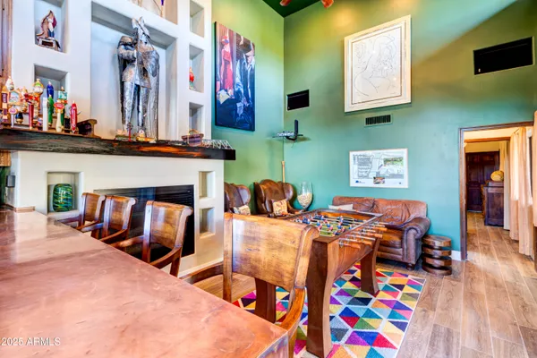 an aerial view of swimming pool outdoor seating and yard