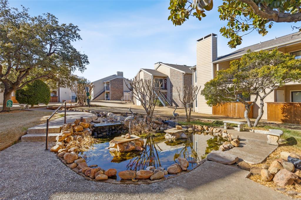 4748 Old Bent Tree Lane, Unit 1901 Dallas, TX 75287 - Photo 17 of 26 a view of a water fountain and a fountain