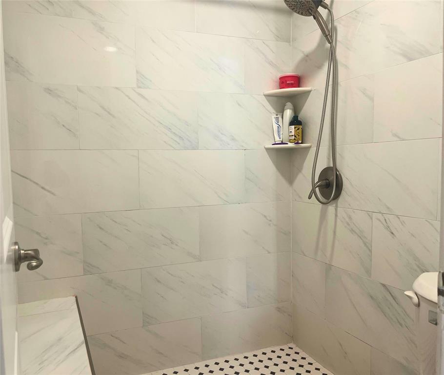 4748 Old Bent Tree Lane, Unit 1901 Dallas, TX 75287 - Photo 25 of 26 a bathroom with a shower