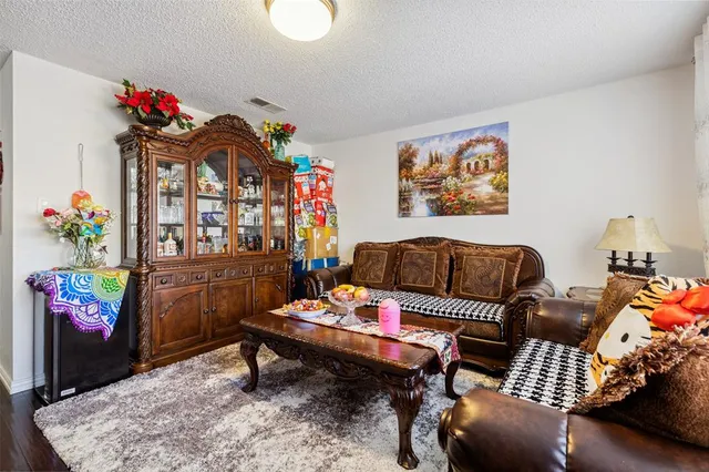 a living room with furniture and a couch
