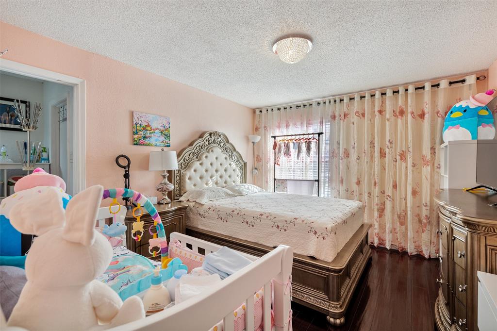 4748 Old Bent Tree Lane, Unit 1901 Dallas, TX 75287 - Photo 7 of 26 a view of a dining room with furniture and a window