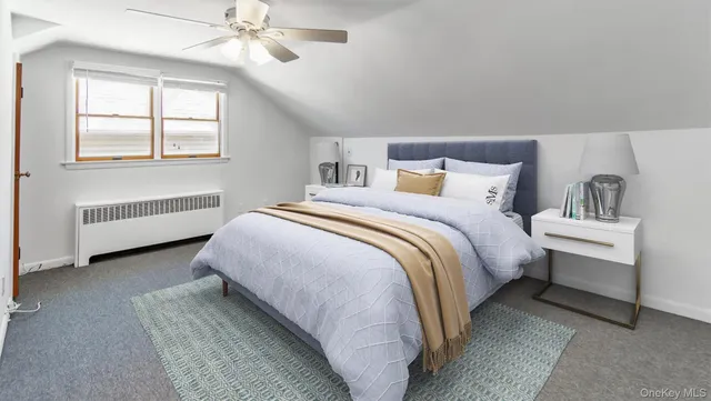 a bed room with a bed and a chandelier