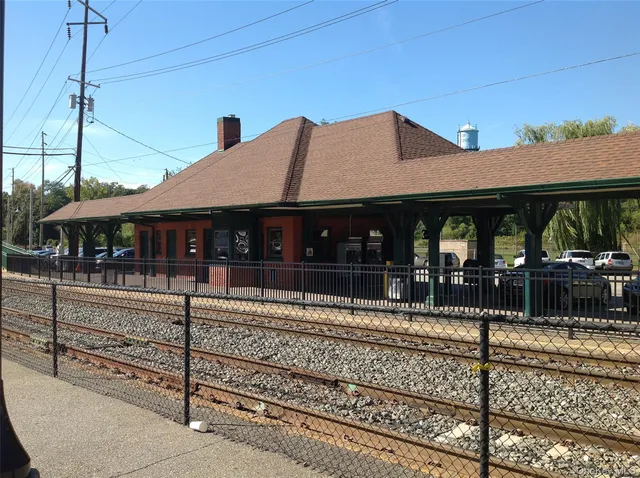 a front view of a house with a porch