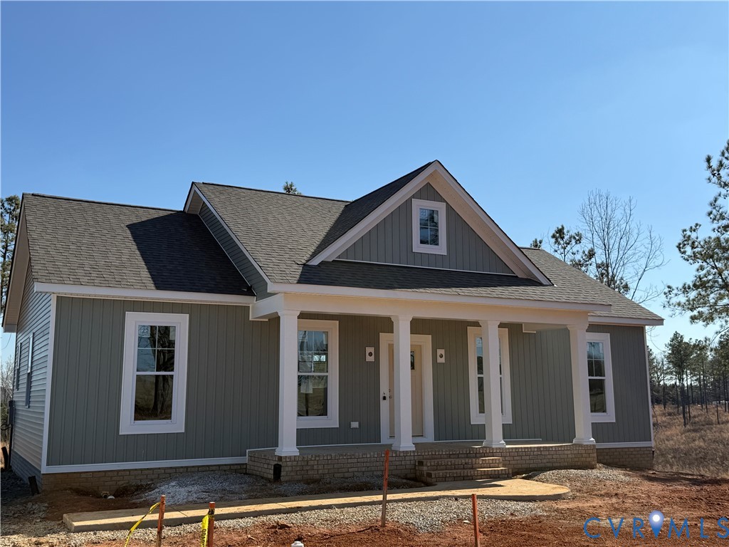 4632 Country Club Road La Crosse, VA 23950 - Photo 2 of 21 a front view of a house with a yard