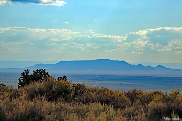 a view of lake with mountain