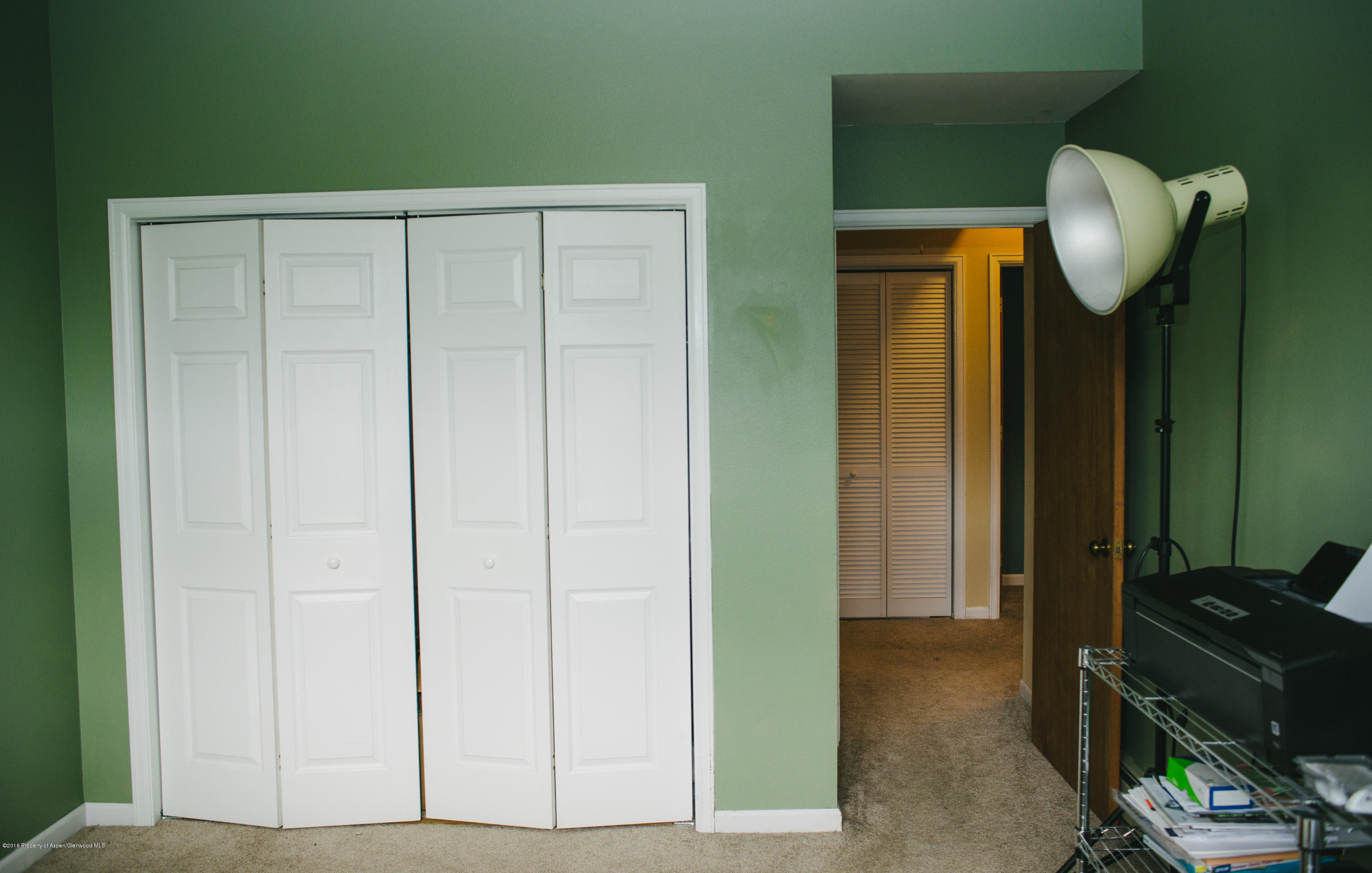 95 Silverado Drive Basalt, CO 81621 - Photo 13 of 18 a view of a hallway and wooden floor