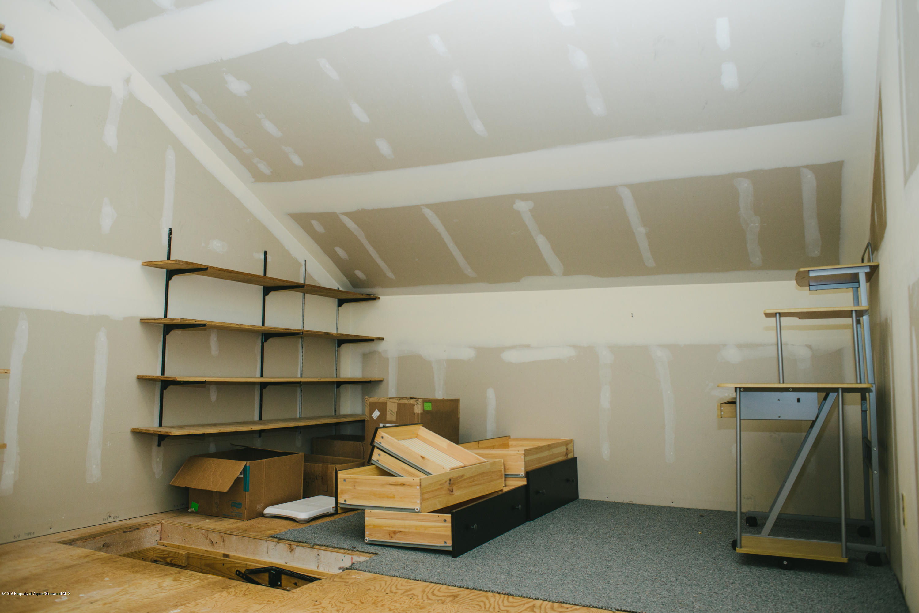 95 Silverado Drive Basalt, CO 81621 - Photo 16 of 18 a living room with a couch and a table