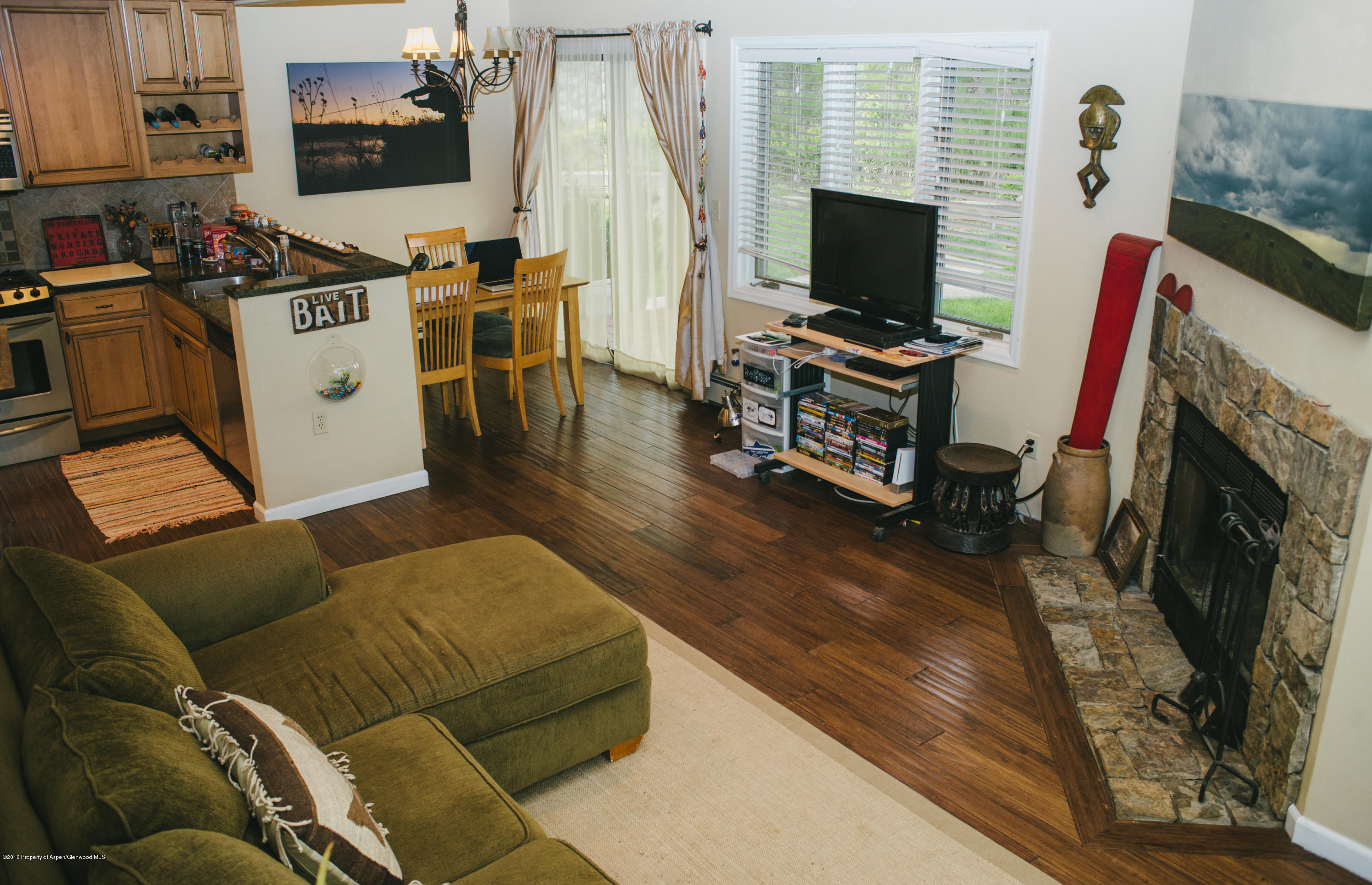95 Silverado Drive Basalt, CO 81621 - Photo 2 of 18 a living room with furniture and a flat screen tv