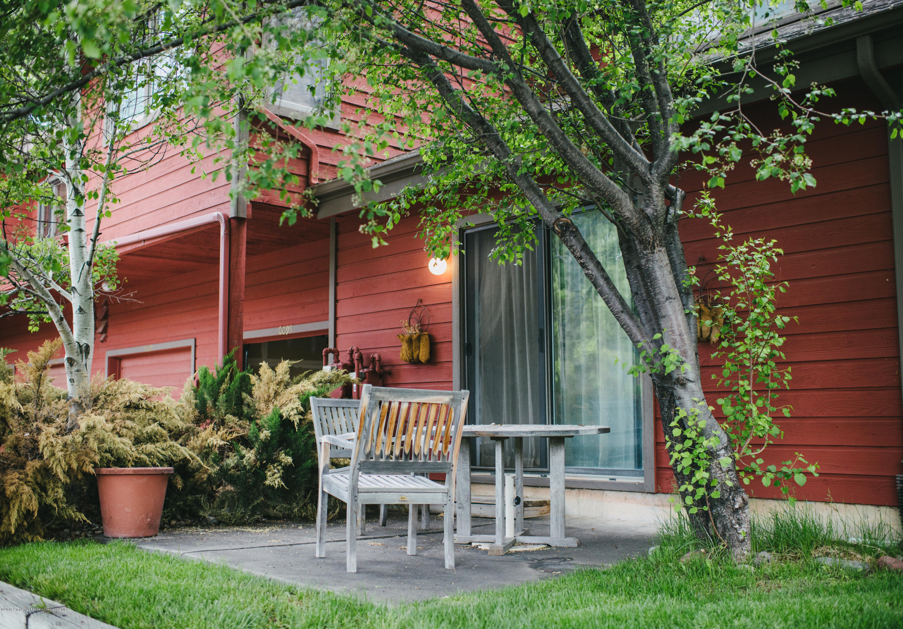 95 Silverado Drive Basalt, CO 81621 - Photo 5 of 18 a view of a chair and table in backyard of the house