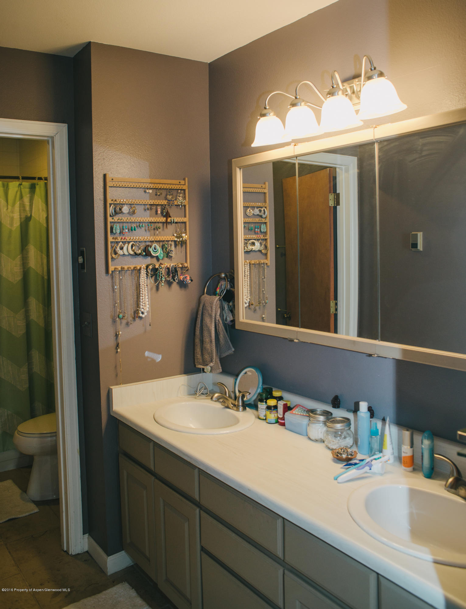 95 Silverado Drive Basalt, CO 81621 - Photo 9 of 18 a bathroom with a sink and a mirror