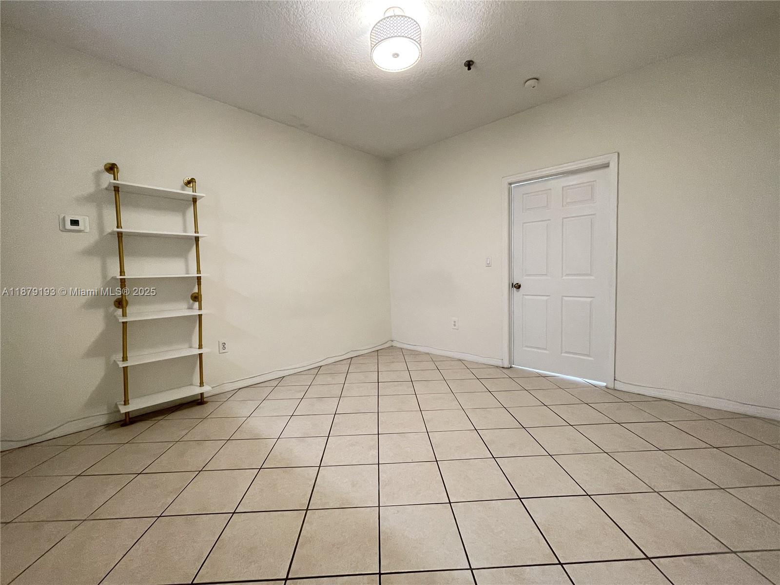 2734 Bird Avenue, Unit 205 Miami, FL 33133 - Photo 14 of 20 a view of an empty room