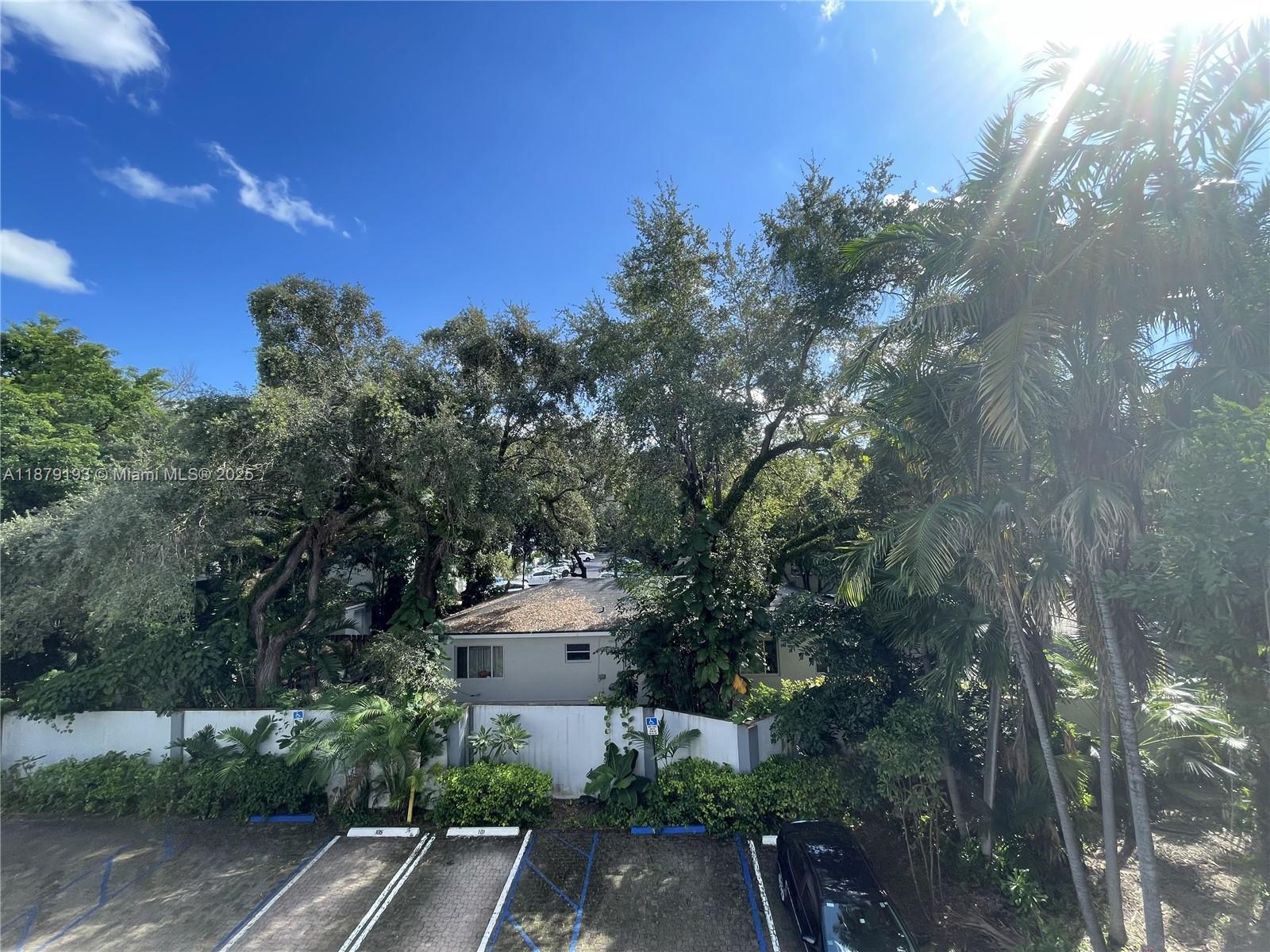 2734 Bird Avenue, Unit 205 Miami, FL 33133 - Photo 15 of 20 a view of a parking space with city view