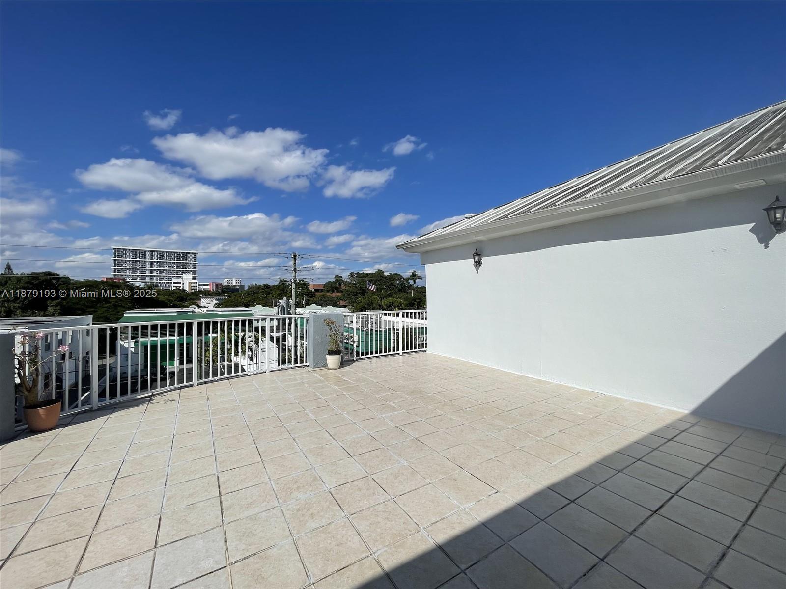 2734 Bird Avenue, Unit 205 Miami, FL 33133 - Photo 18 of 20 a view of balcony with furniture