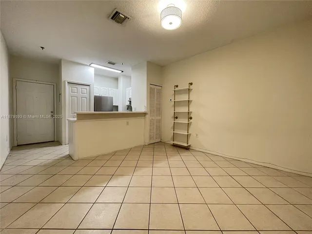 a view of a kitchen with a sink