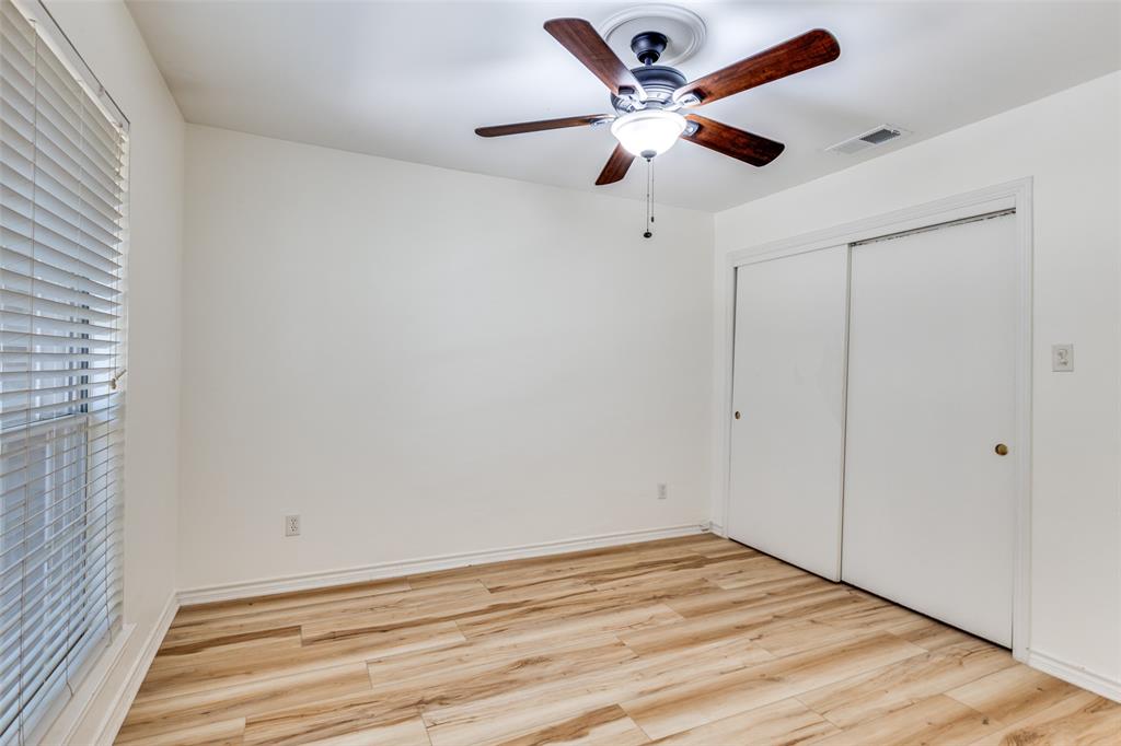 8555 Fair Oaks Crossing, Unit 702 Dallas, TX 75243 - Photo 21 of 26 wooden floor in an empty room