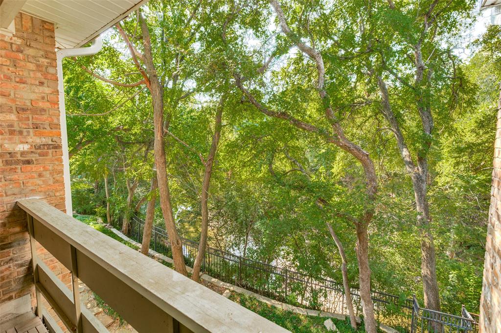 8555 Fair Oaks Crossing, Unit 702 Dallas, TX 75243 - Photo 25 of 26 a view of a garden from a balcony