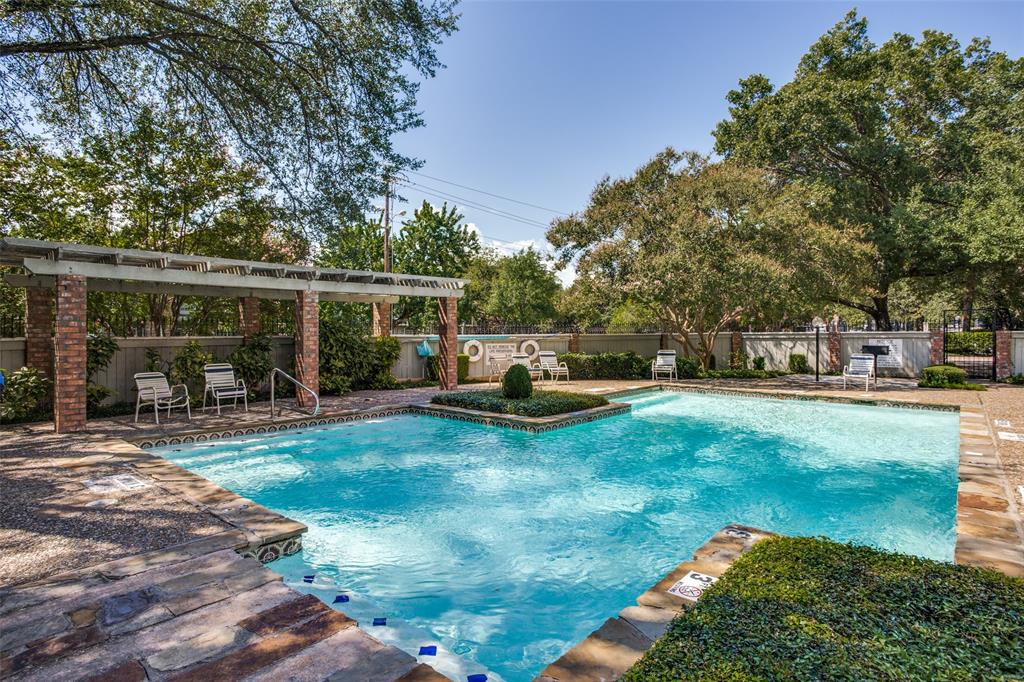 8555 Fair Oaks Crossing, Unit 702 Dallas, TX 75243 - Photo 7 of 26 a view of a house with backyard sitting area and garden