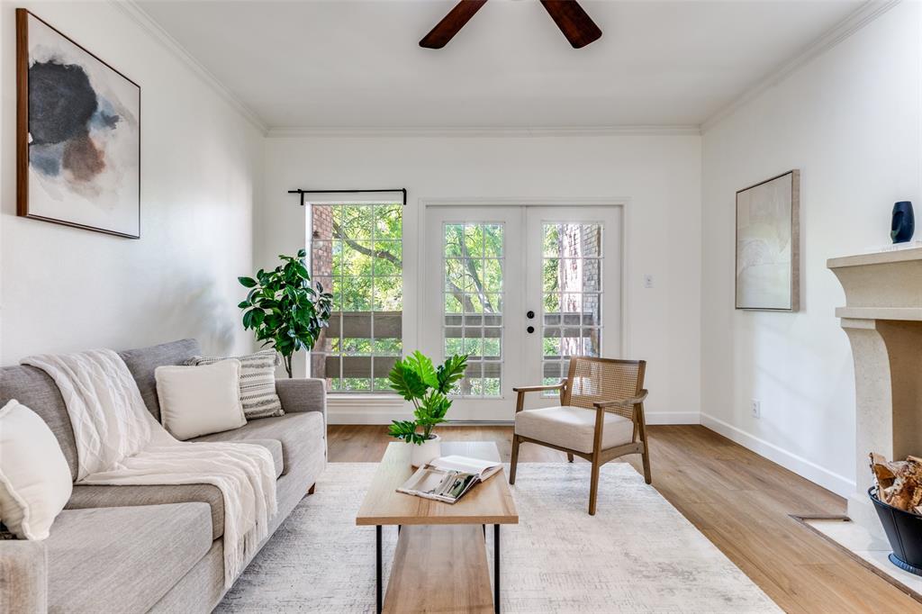 8555 Fair Oaks Crossing, Unit 702 Dallas, TX 75243 - Photo 9 of 26 a living room with furniture and a potted plant