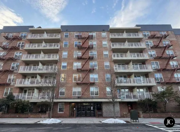 a front view of a building with street view