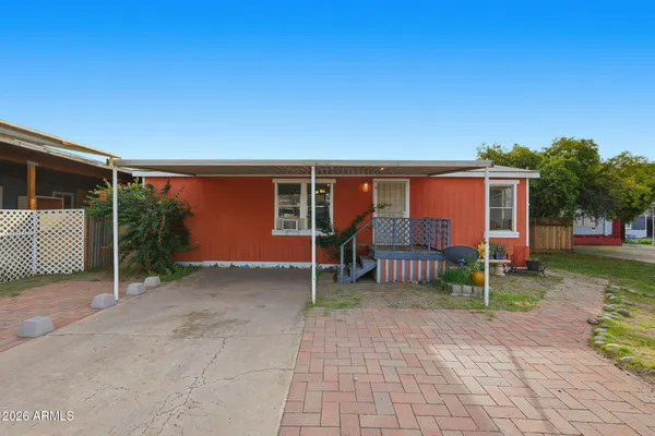 a house view with a backyard space