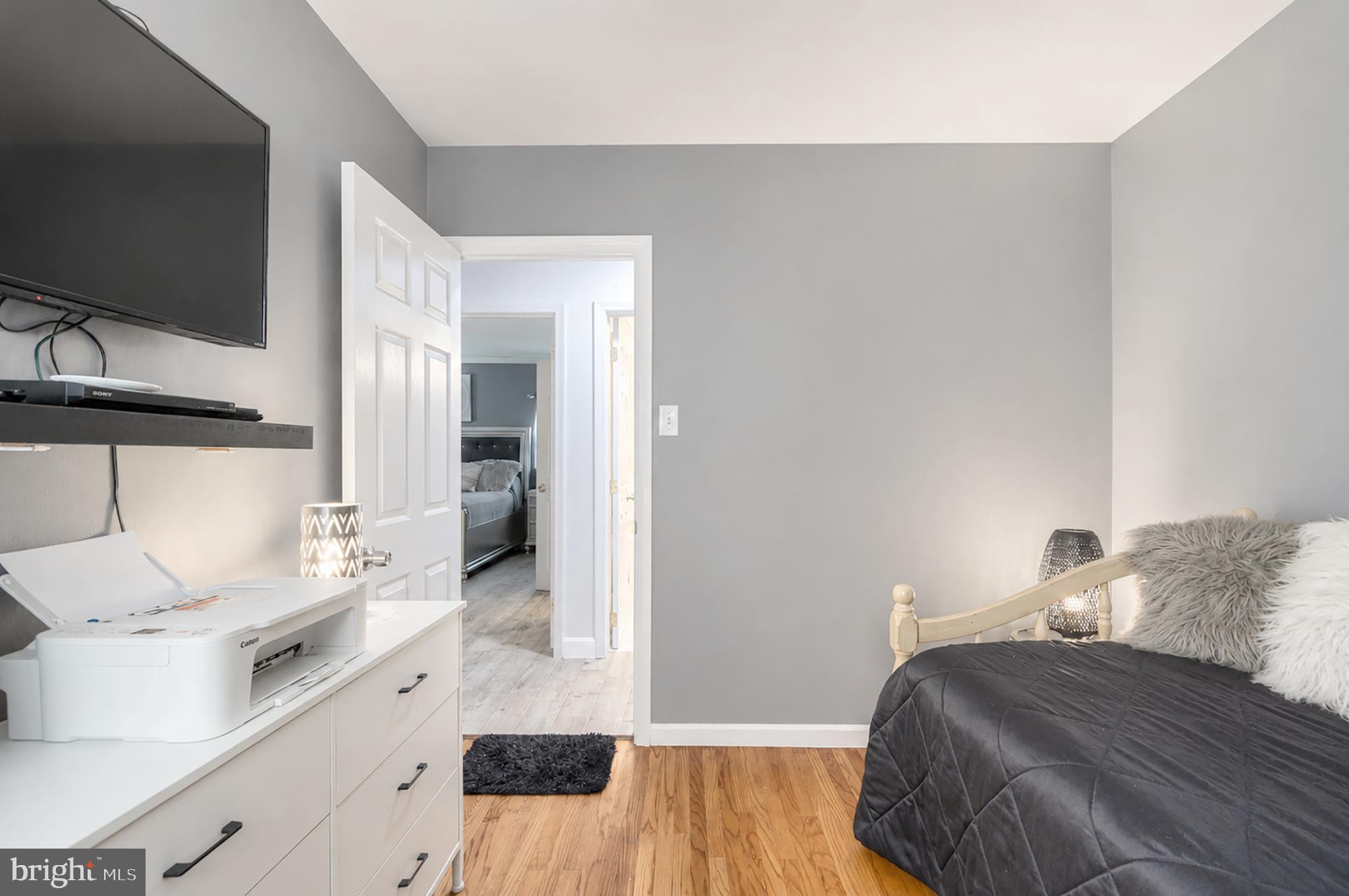 32 Bryant Road Turnersville, NJ 08012 - Photo 20 of 33 a bedroom with a bed and a large mirror in it