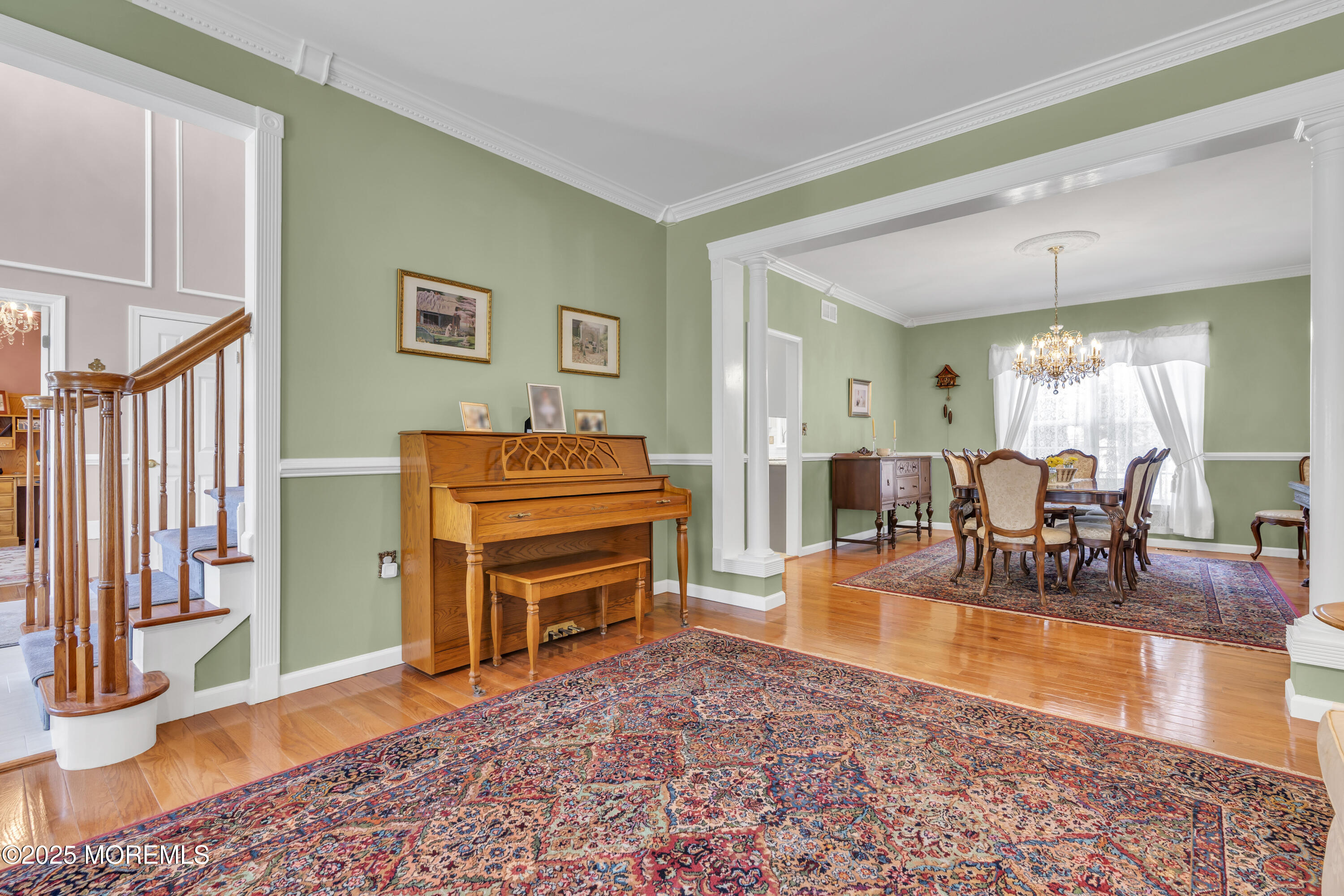 43 Periwinkle Circle Tinton Falls, NJ 07712 - Photo 14 of 60 a living room with furniture a dining table and chairs with wooden floor