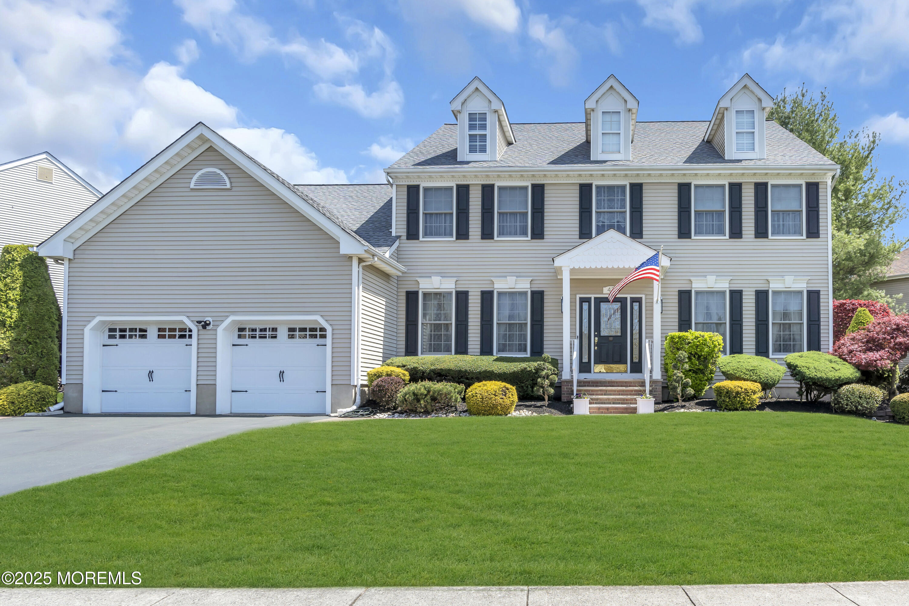 43 Periwinkle Circle Tinton Falls, NJ 07712 - Photo 2 of 60 a front view of a house with garden