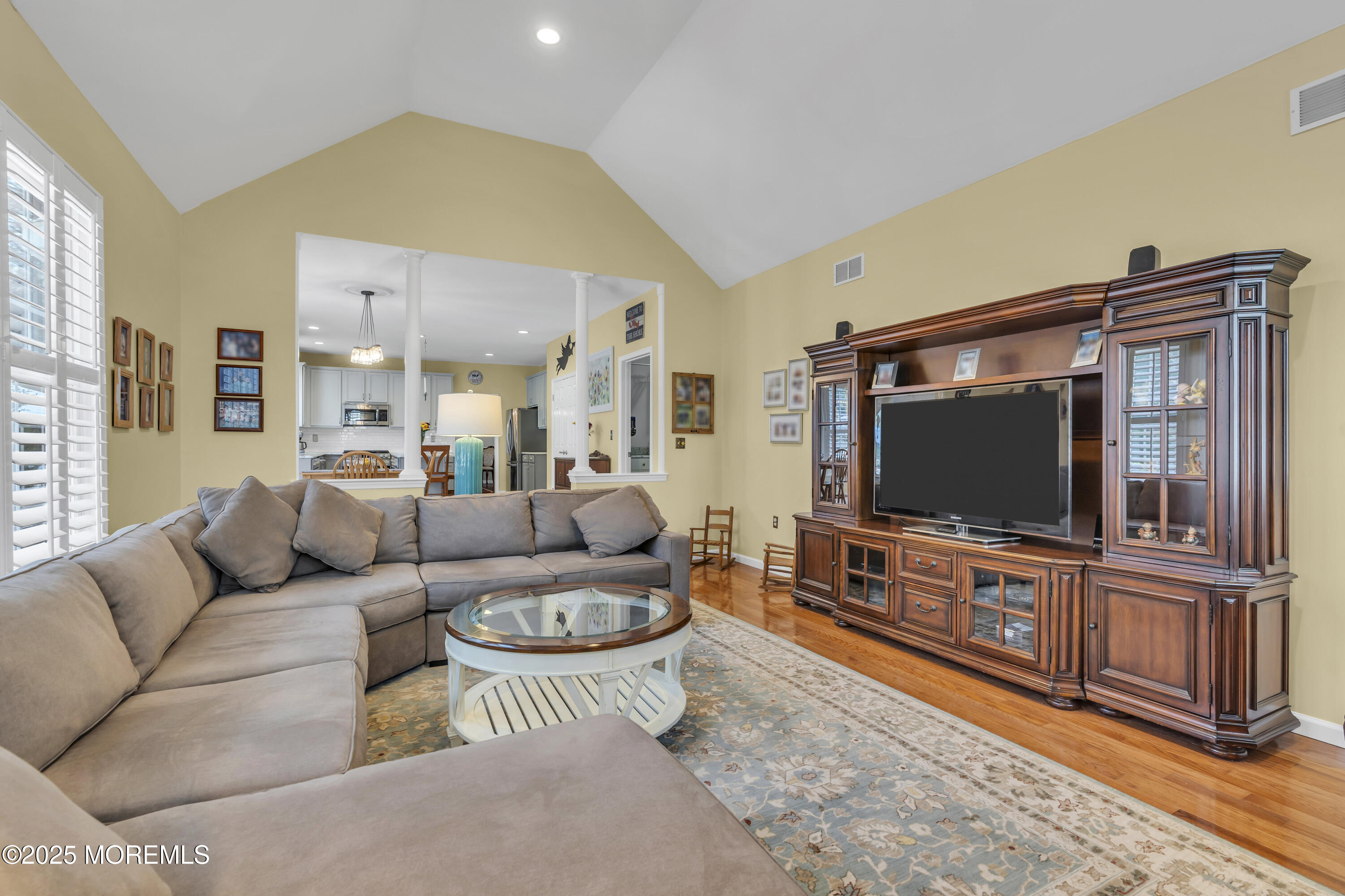 43 Periwinkle Circle Tinton Falls, NJ 07712 - Photo 29 of 60 a living room with furniture and a flat screen tv