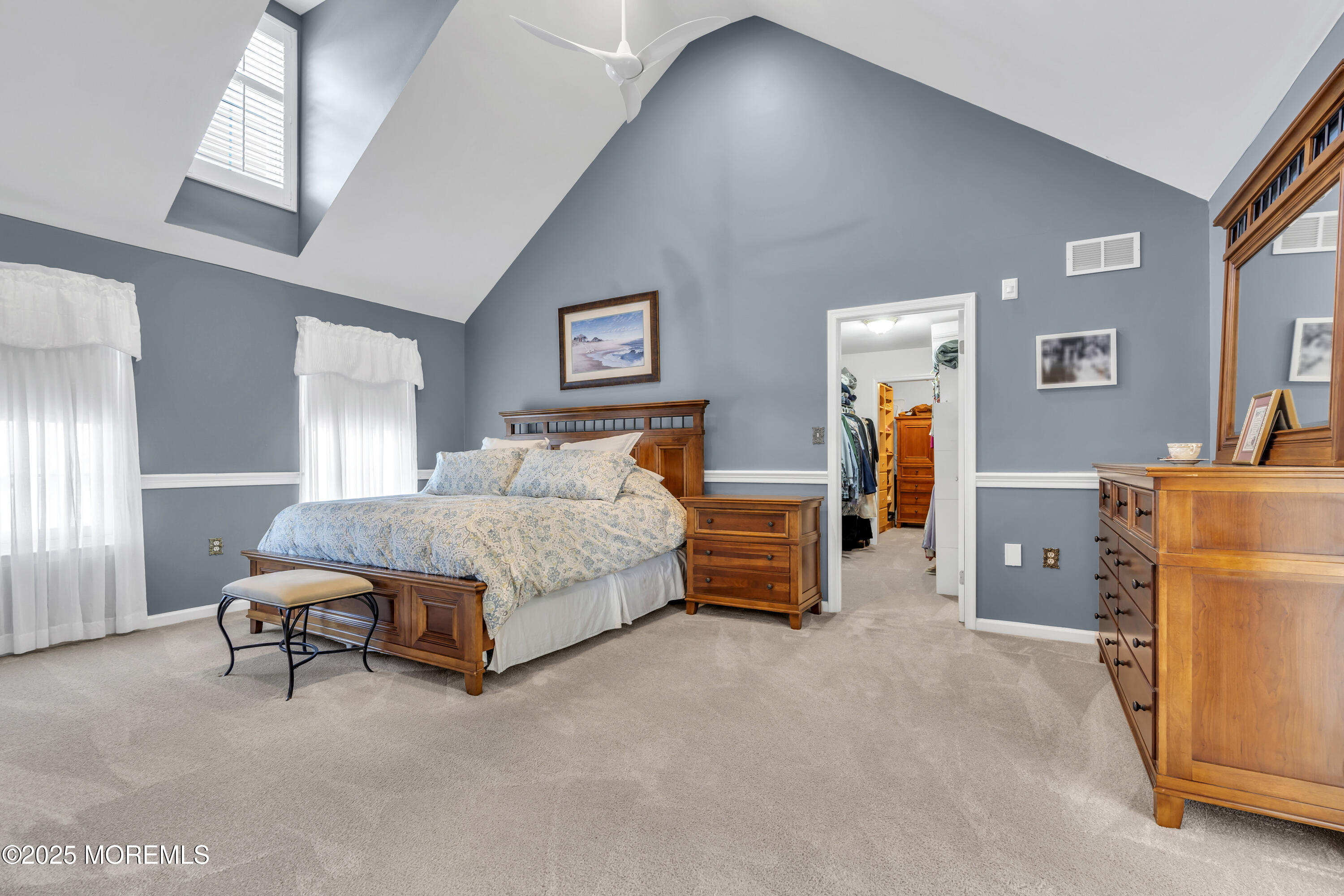 43 Periwinkle Circle Tinton Falls, NJ 07712 - Photo 31 of 60 a bedroom with a bed and a lamp