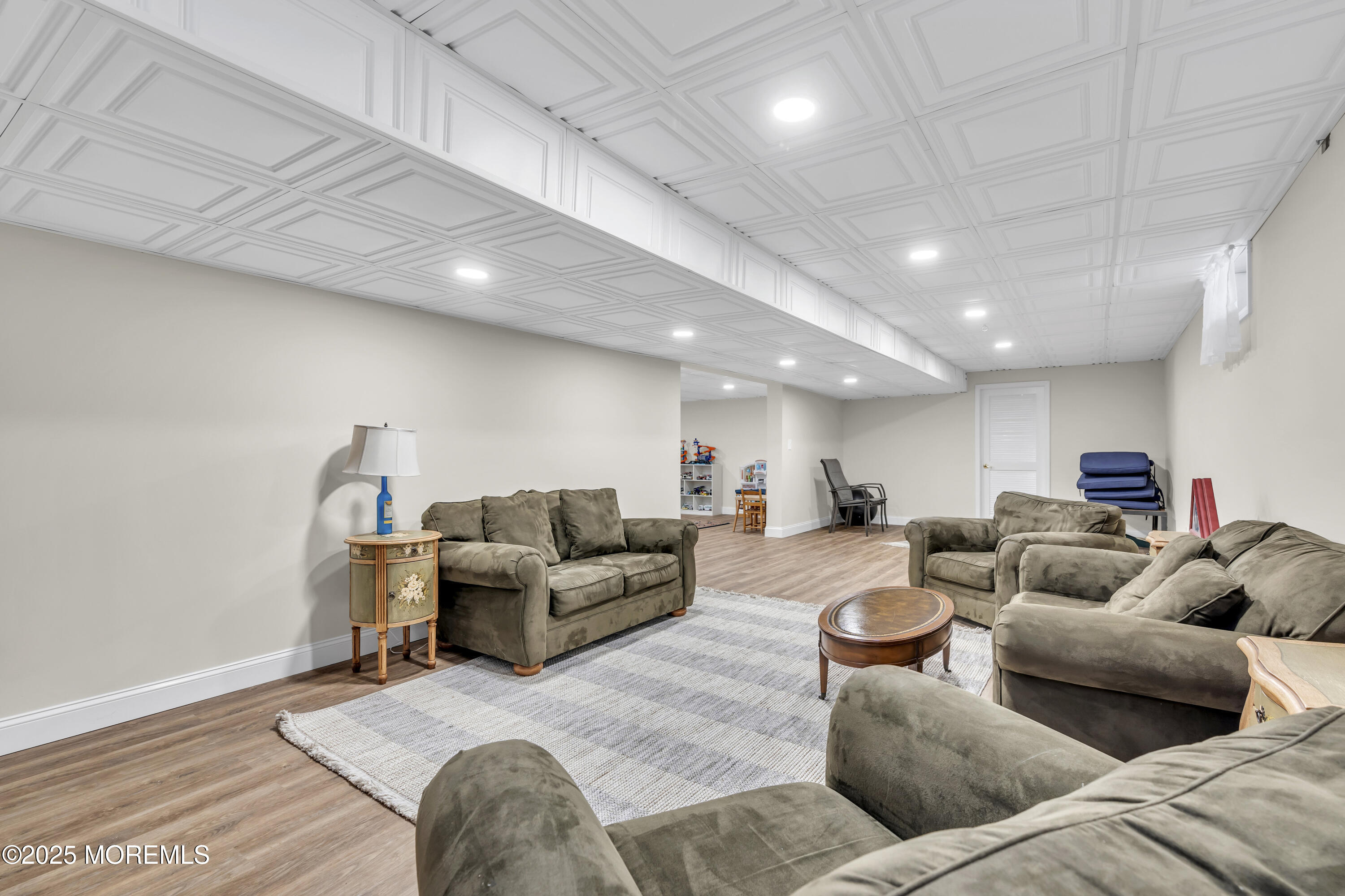 43 Periwinkle Circle Tinton Falls, NJ 07712 - Photo 41 of 60 a living room with furniture and a couch