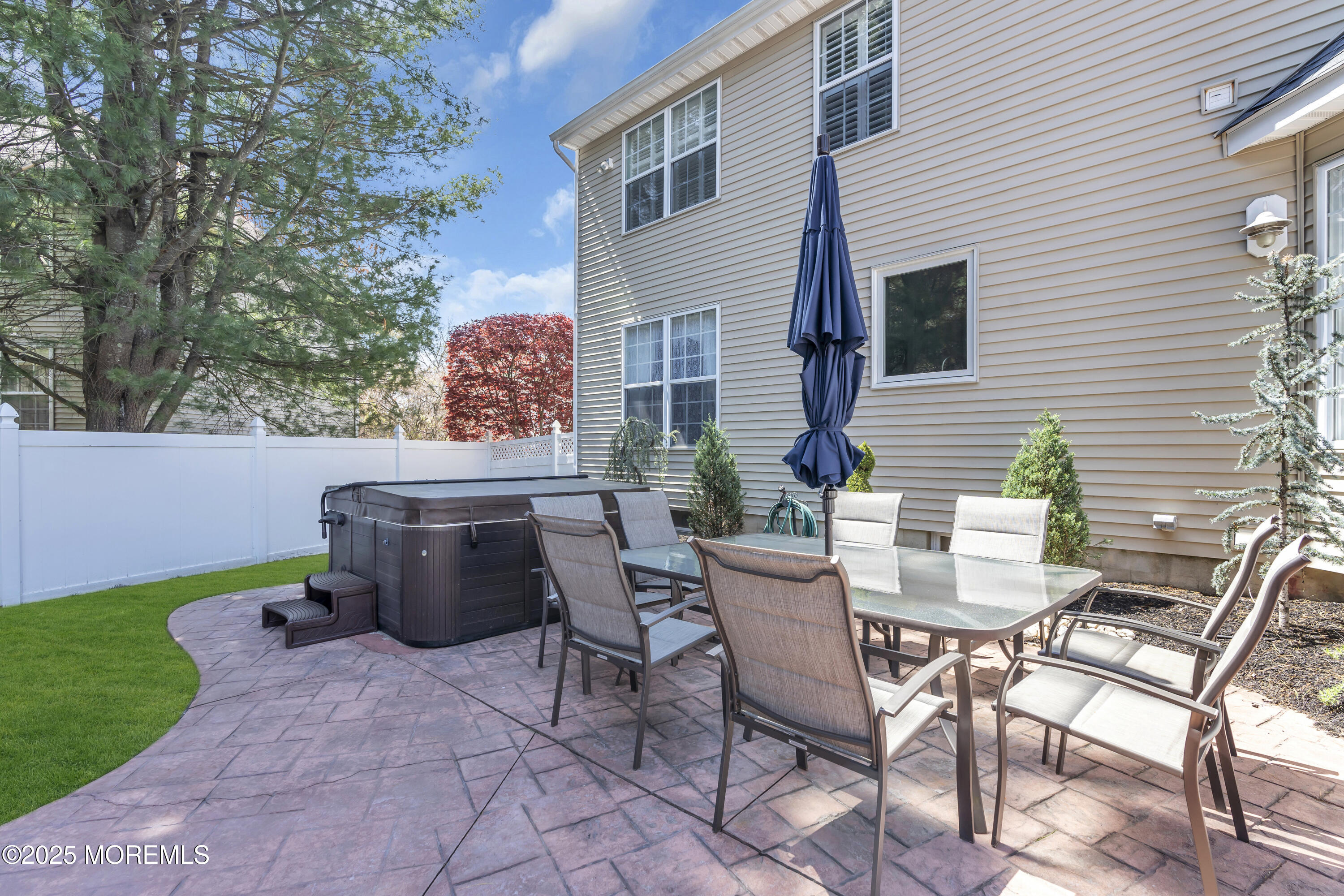 43 Periwinkle Circle Tinton Falls, NJ 07712 - Photo 47 of 60 a view of backyard of house with yard and seating