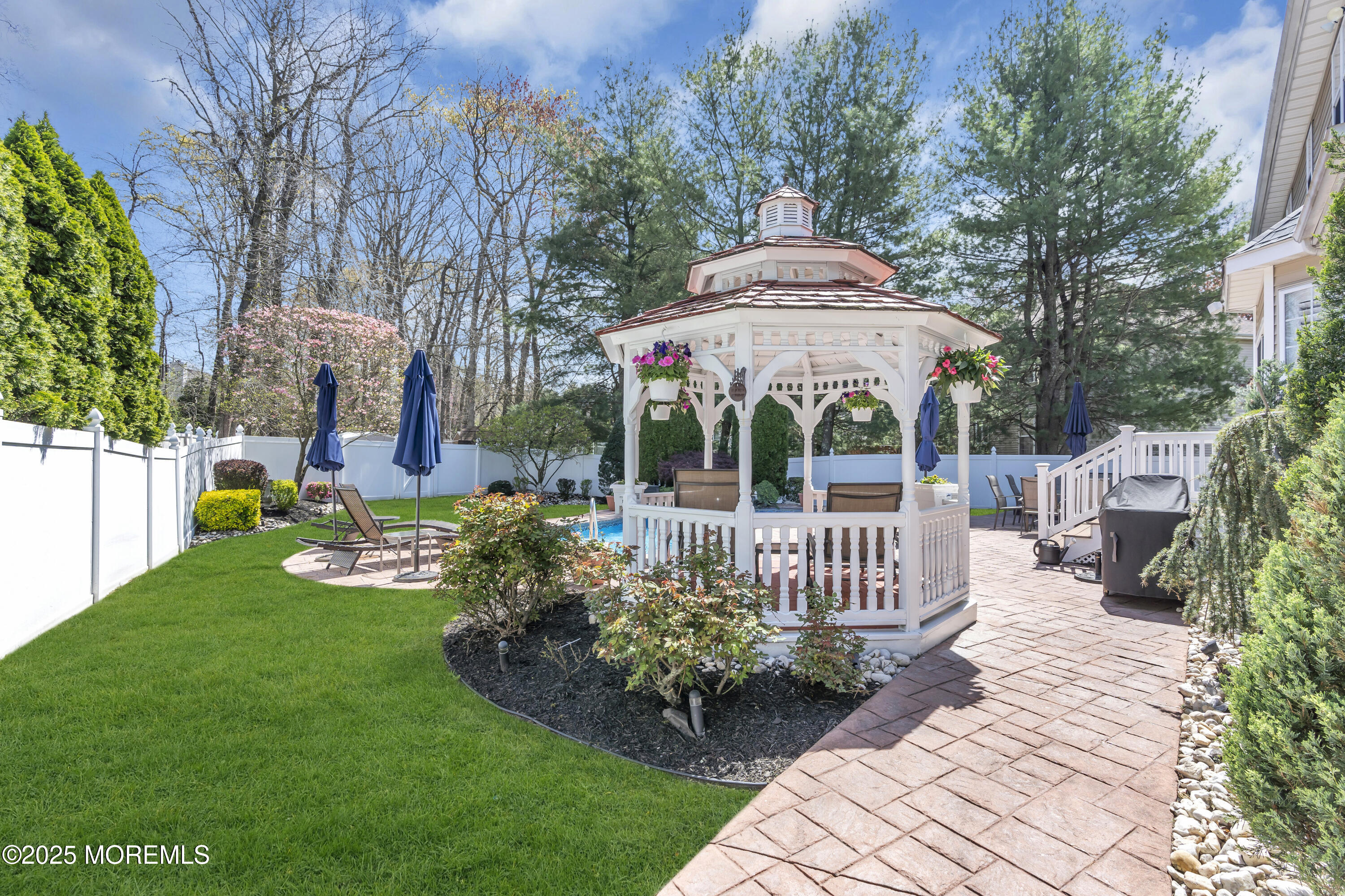 43 Periwinkle Circle Tinton Falls, NJ 07712 - Photo 48 of 60 a front view of a house with garden