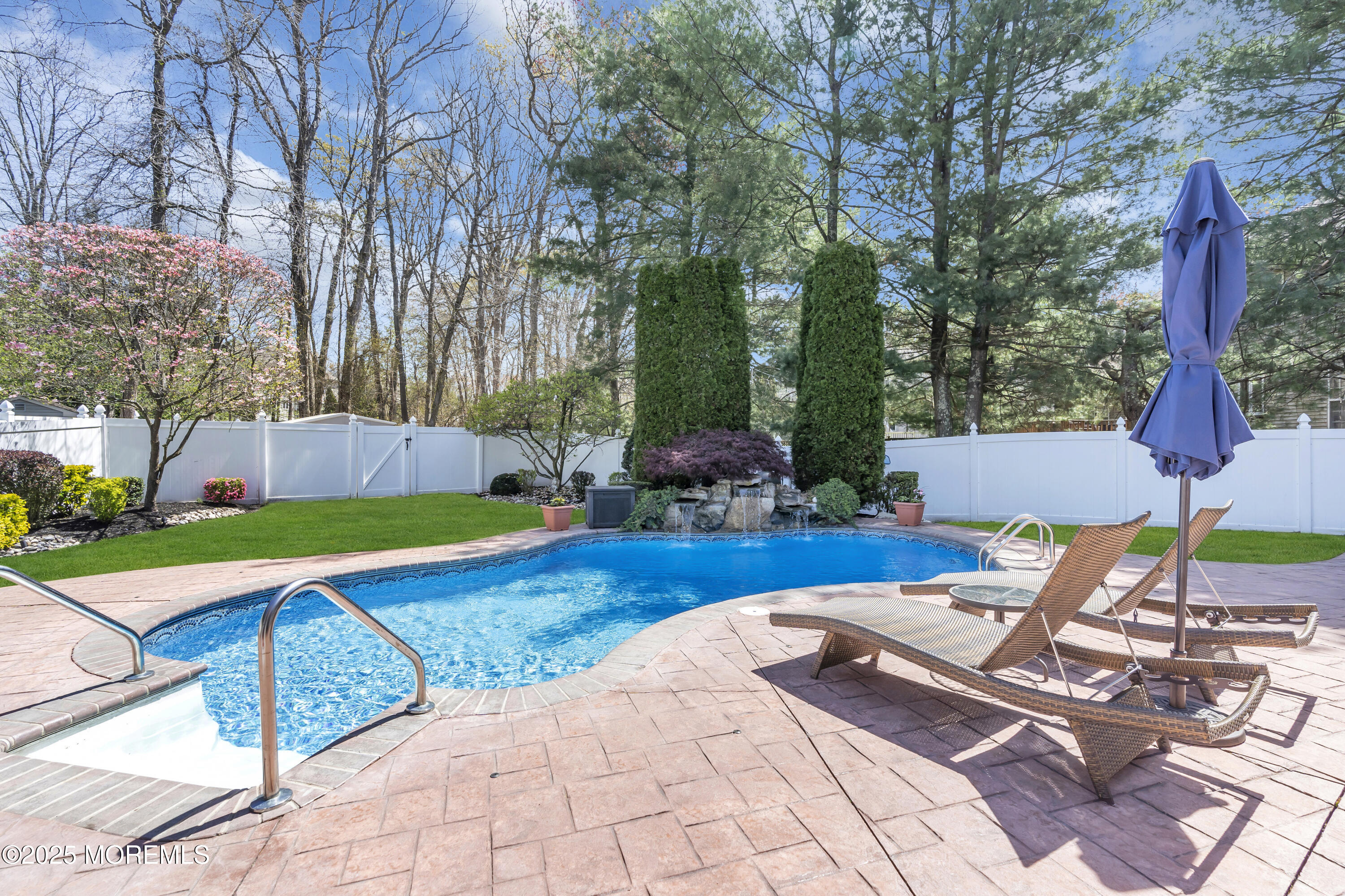 43 Periwinkle Circle Tinton Falls, NJ 07712 - Photo 52 of 60 a view of backyard with swimming pool and seating space