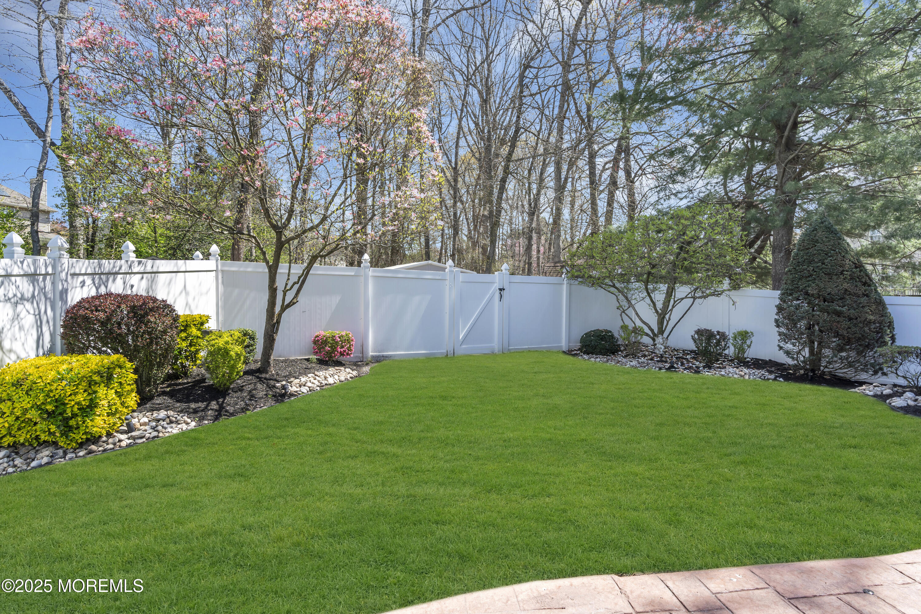 43 Periwinkle Circle Tinton Falls, NJ 07712 - Photo 56 of 60 a view of a backyard with garden