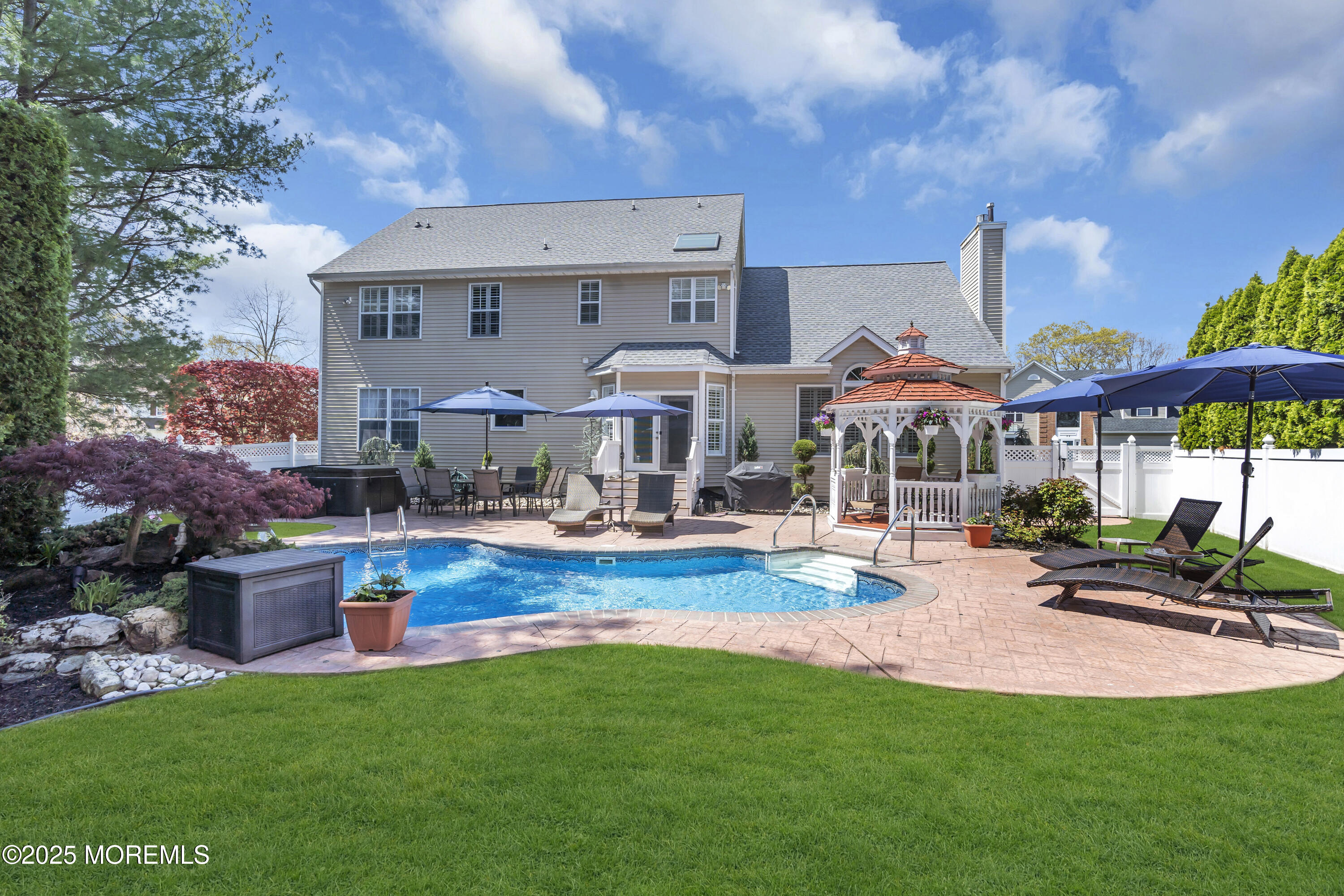 43 Periwinkle Circle Tinton Falls, NJ 07712 - Photo 58 of 60 a view of the house with swimming pool yard fire pit and outdoor seating