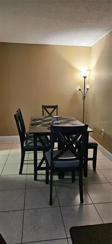 a view of a workspace with furniture