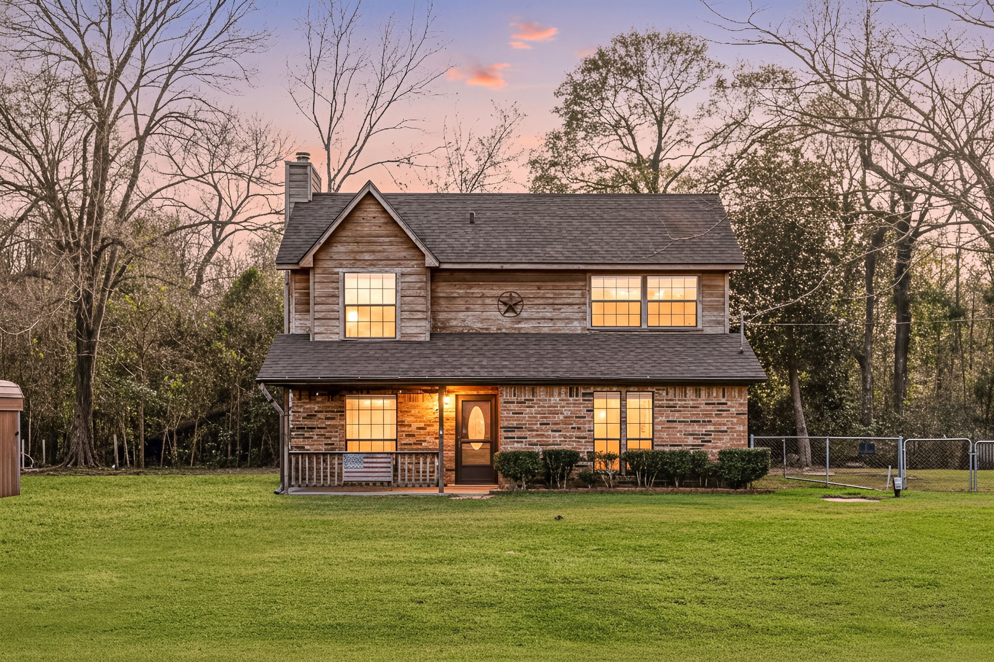 236 Pine Ridge Drive Cleveland, TX 77327 - Photo 1 of 30 a front view of a house with a garden