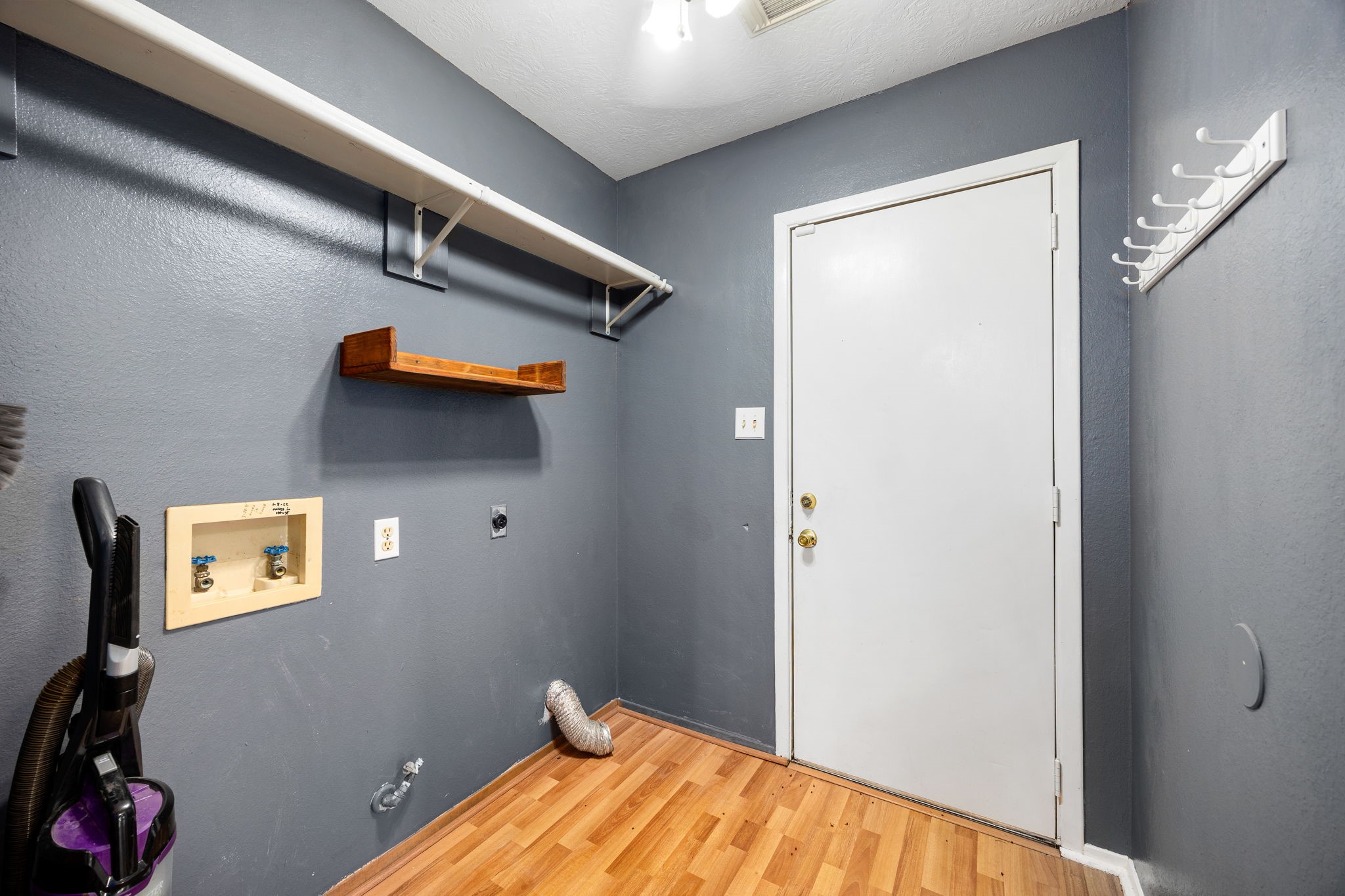 236 Pine Ridge Drive Cleveland, TX 77327 - Photo 11 of 30 a view of a room with wooden floor and closet