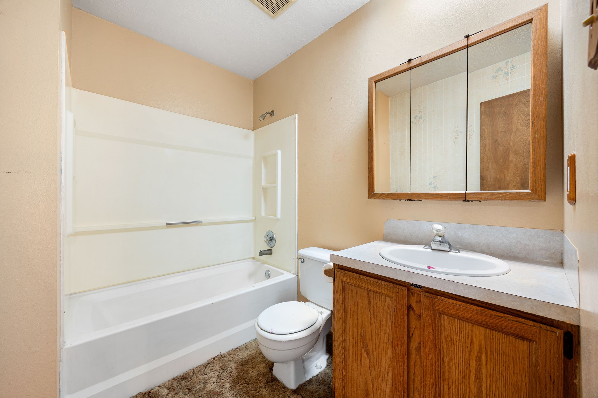 236 Pine Ridge Drive Cleveland, TX 77327 - Photo 19 of 30 a bathroom with a sink toilet and shower