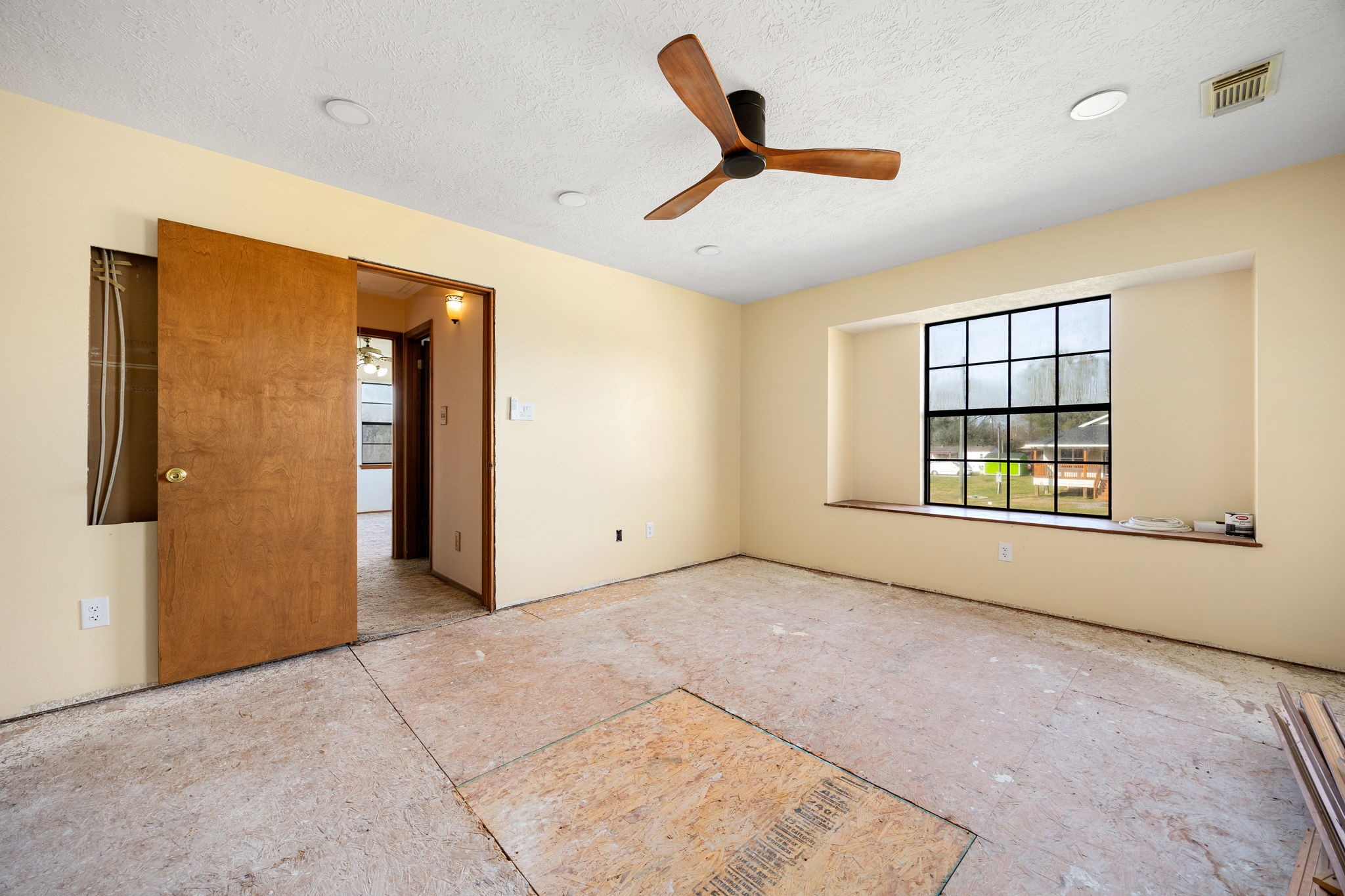 236 Pine Ridge Drive Cleveland, TX 77327 - Photo 20 of 30 a view of an empty room with a window
