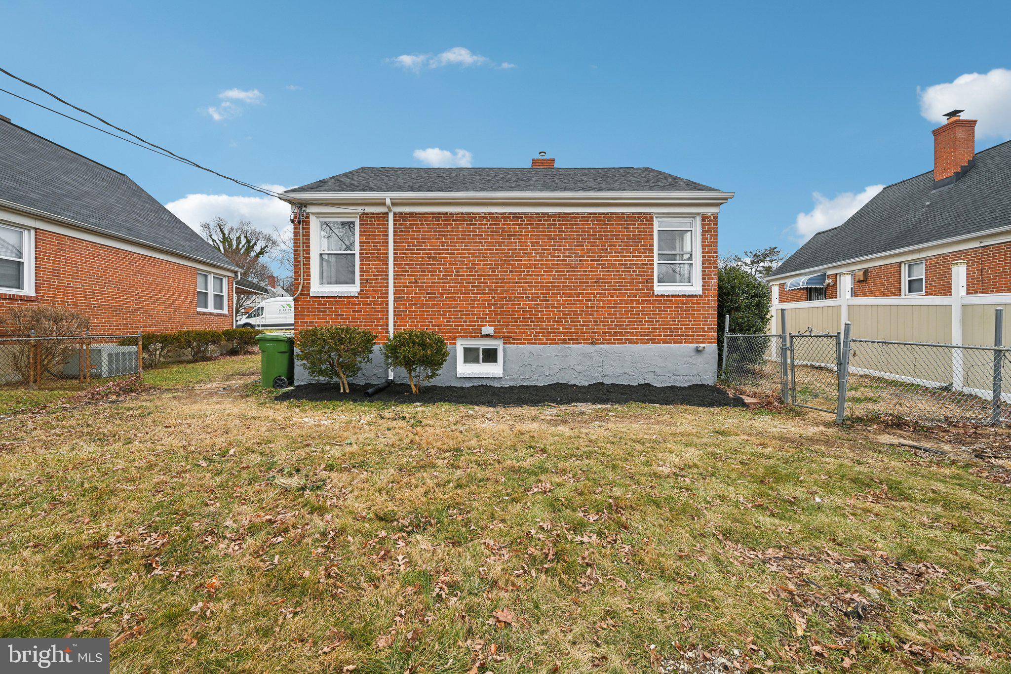 4902 Gilray Drive Baltimore, MD 21214 - Photo 47 of 54 a front view of a house with a yard