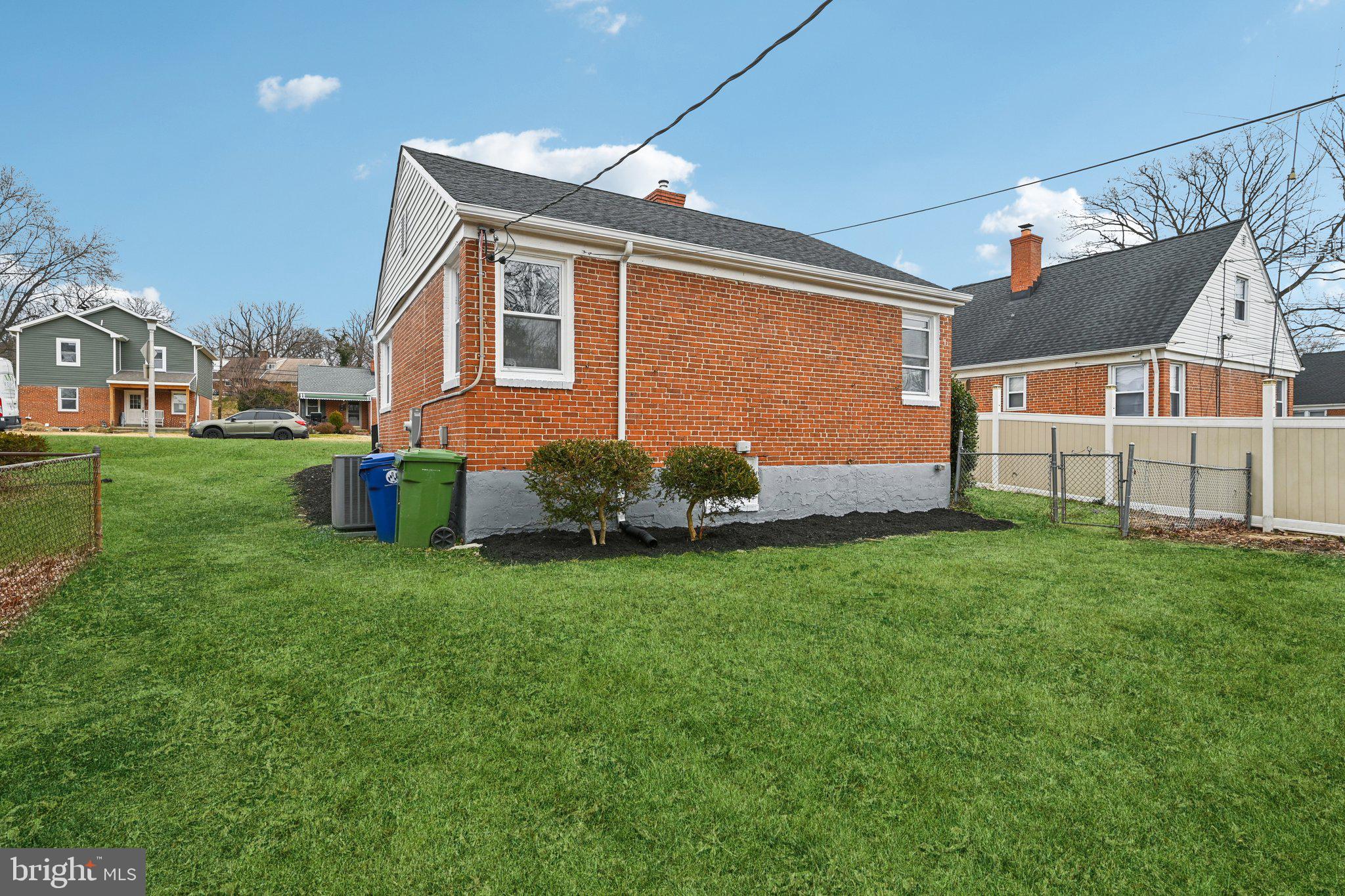 4902 Gilray Drive Baltimore, MD 21214 - Photo 51 of 54 a front view of house with yard