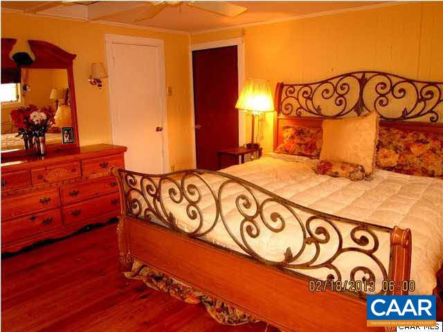 2317 Wakefield Road Charlottesville, VA 22901 - Photo 12 of 30 a bedroom with a bed and a window