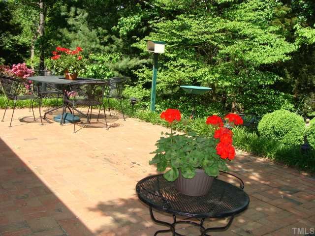 4210 Laurel Ridge Drive Raleigh, NC 27612 - Photo 3 of 12 Closer view of 23' brick patio and permanent natural gas grill.